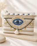 Εκρού boho eye crossbody bag με μπλε λεπτομέρειες