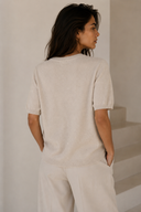 Cream short sleeve knit top