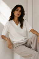 Cream V-neck knit top