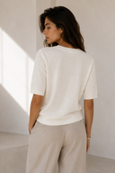 Cream V-neck knit top