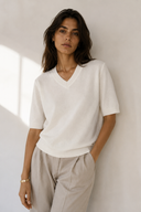 Cream V-neck knit top